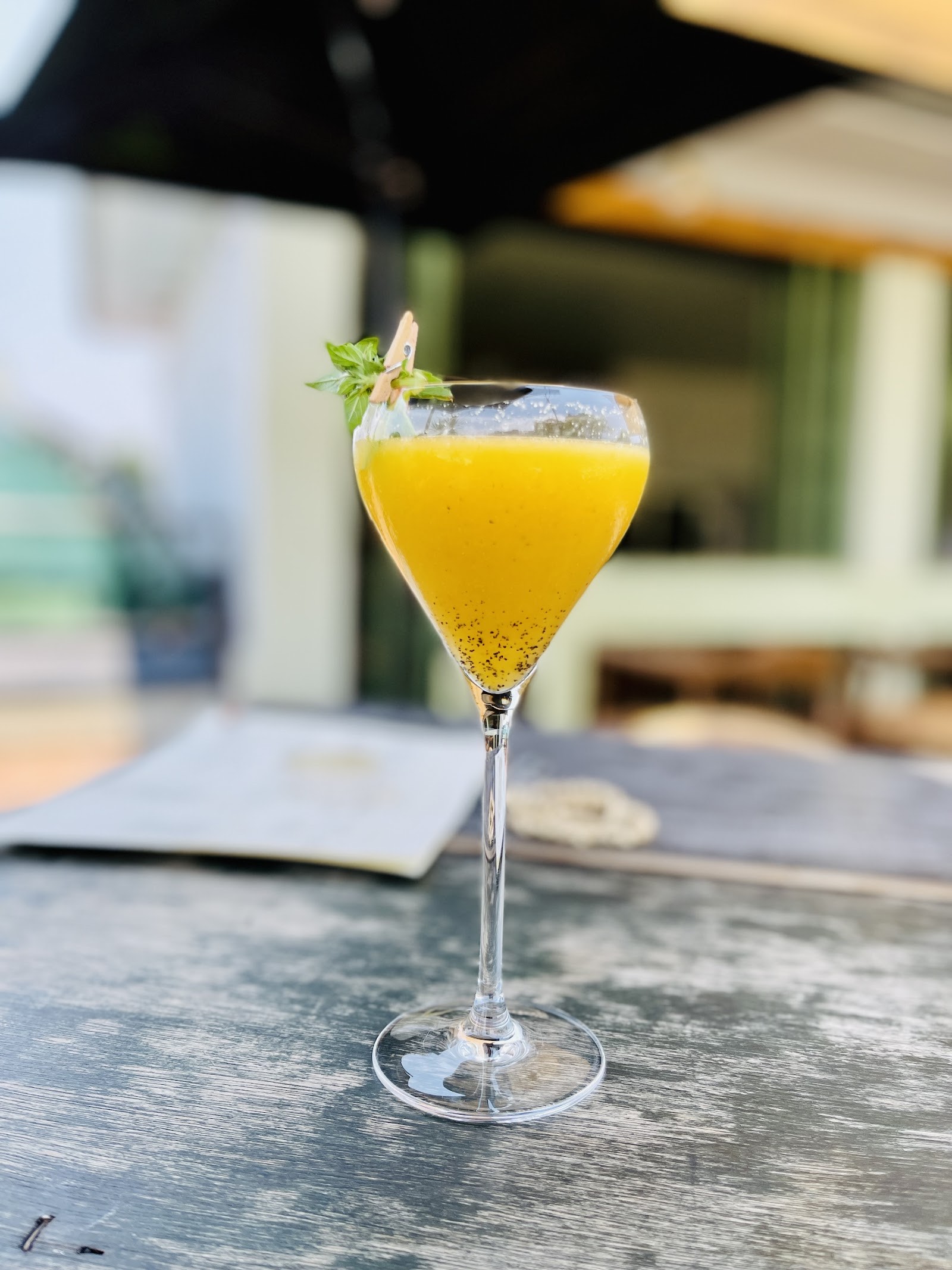 a mezcal cocktail with basil