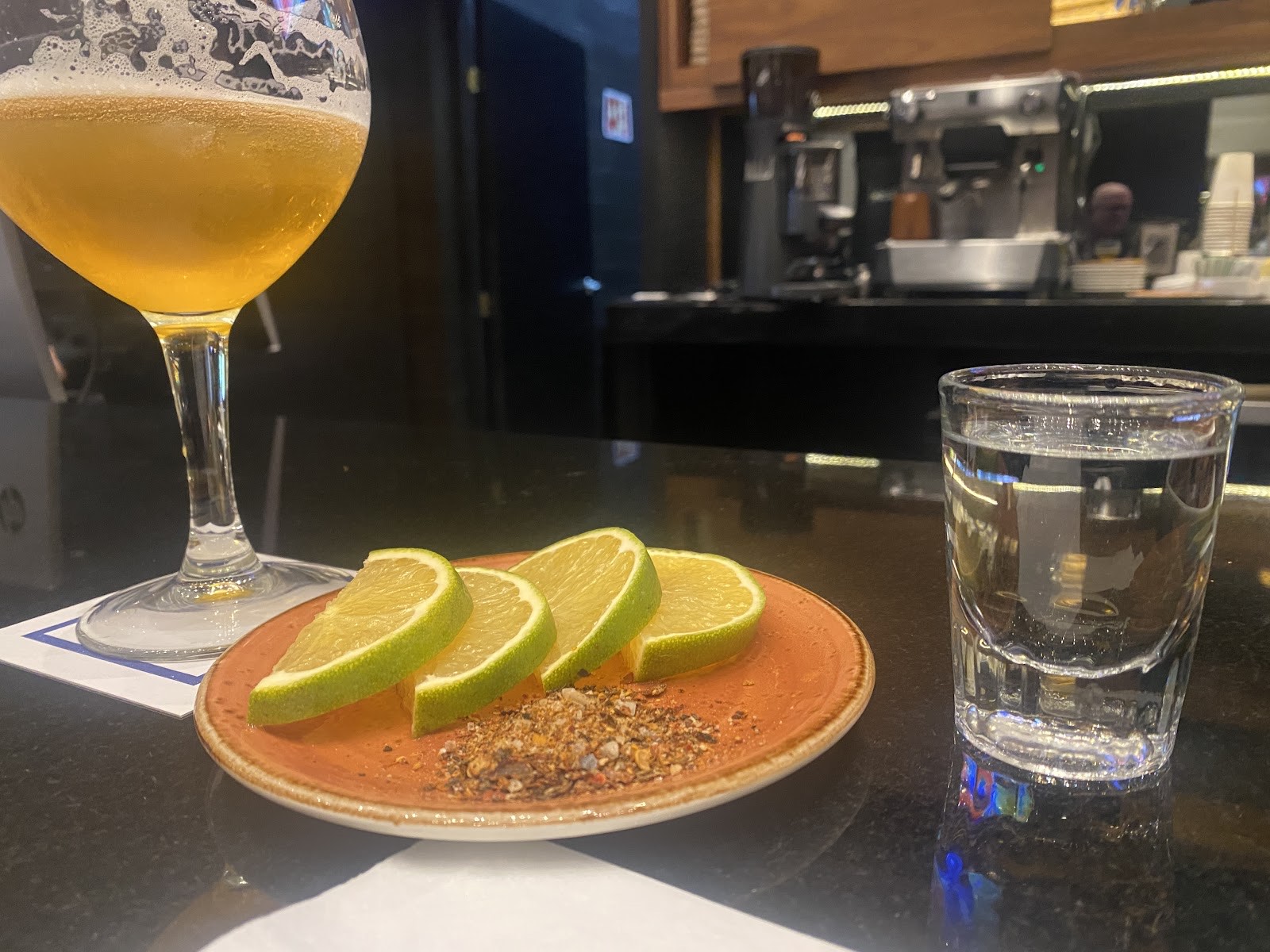 a mezcal pour with lime and chili