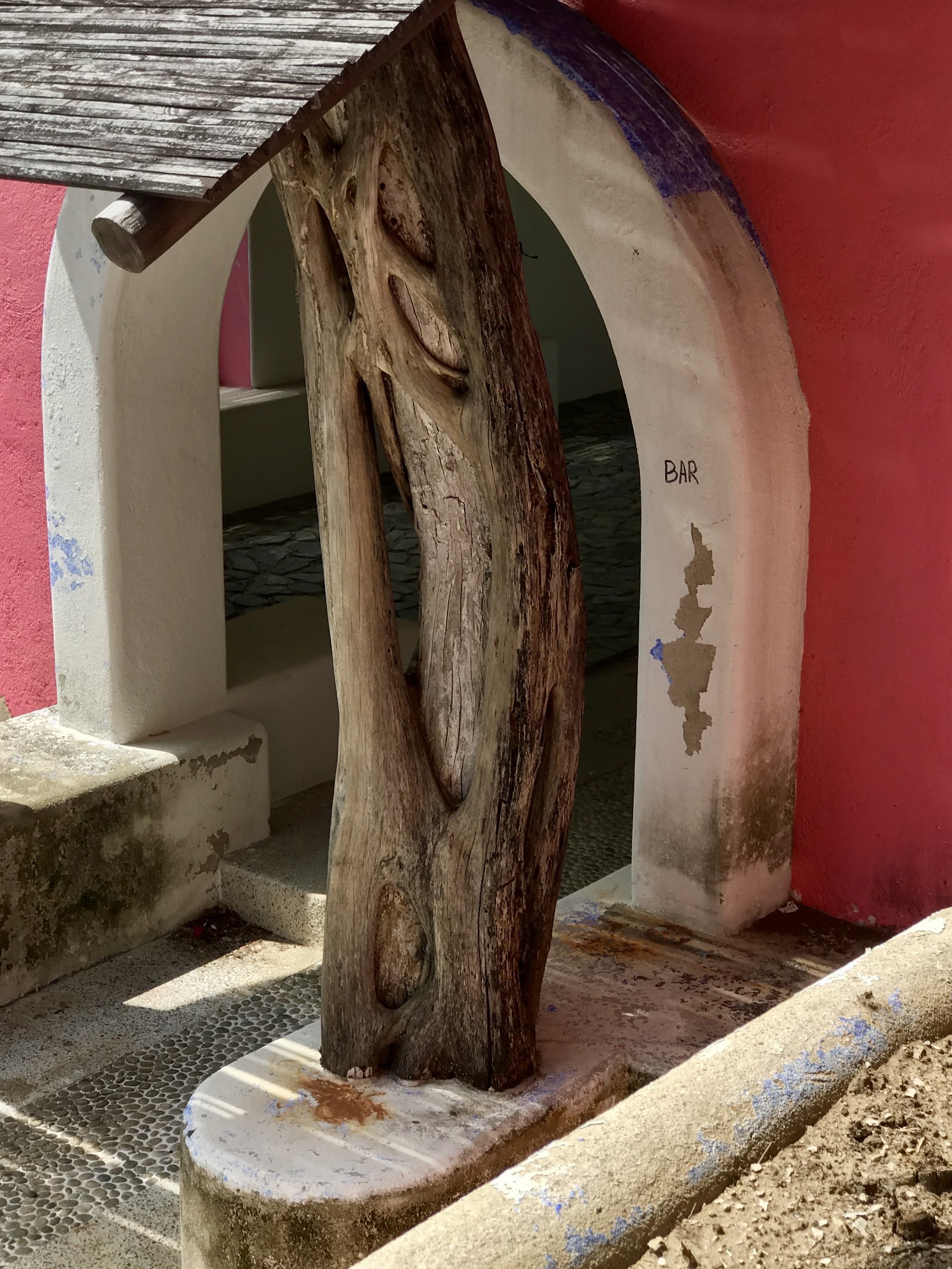 a carved post at the palenque bar