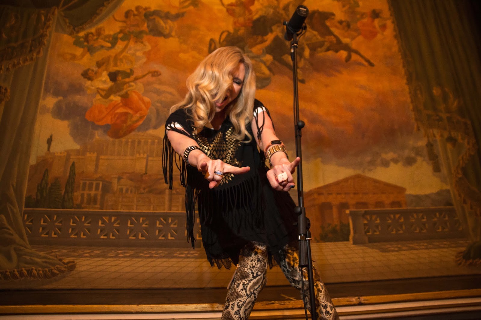 woman performing on ornate stage
