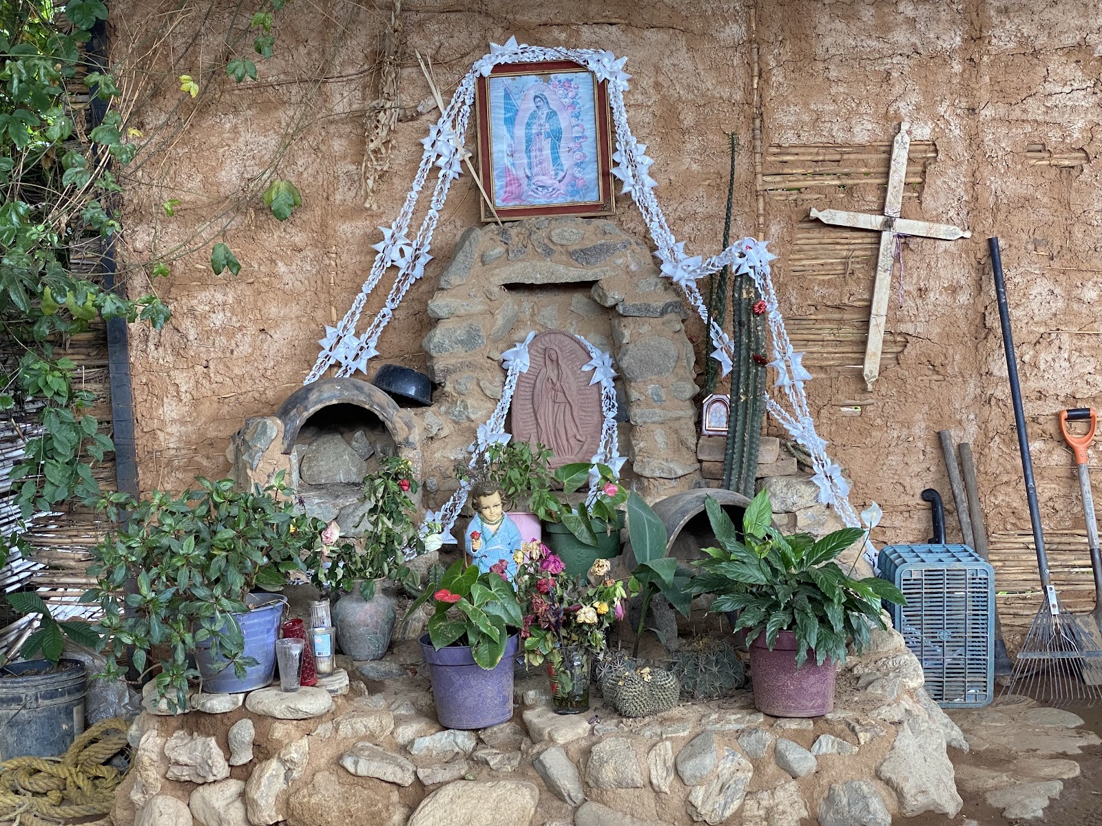 roadside shrine with religious icons
