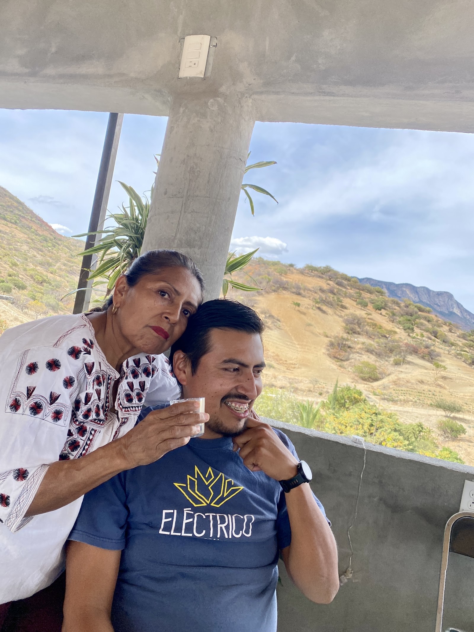 an elder couple tasting mezcal